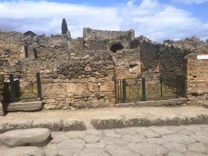 Pompeii ruins -- note large cobble stone road